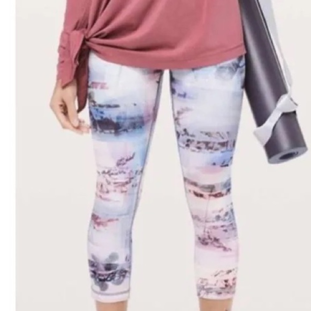 Lululemon High-Rise Tight Legging. Sunrise Silhouette Pink & Blue print. Size 4.
